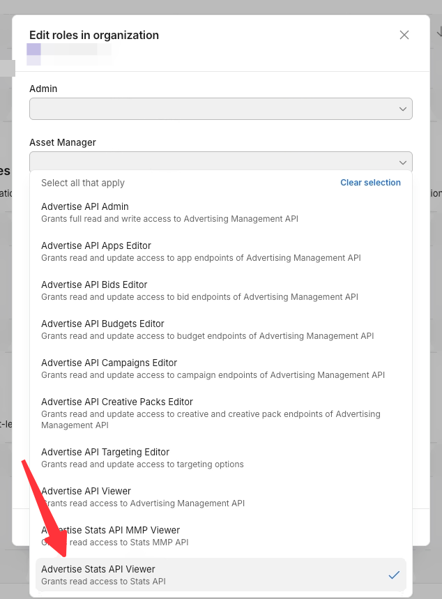 Unity Cloud 编辑组织角色弹窗，箭头指向已勾选的 Advertise Stats API Viewer